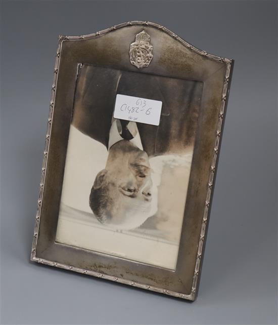 A white metal mounted dome topped photograph frame with monogram and coronet, 25.5cm.